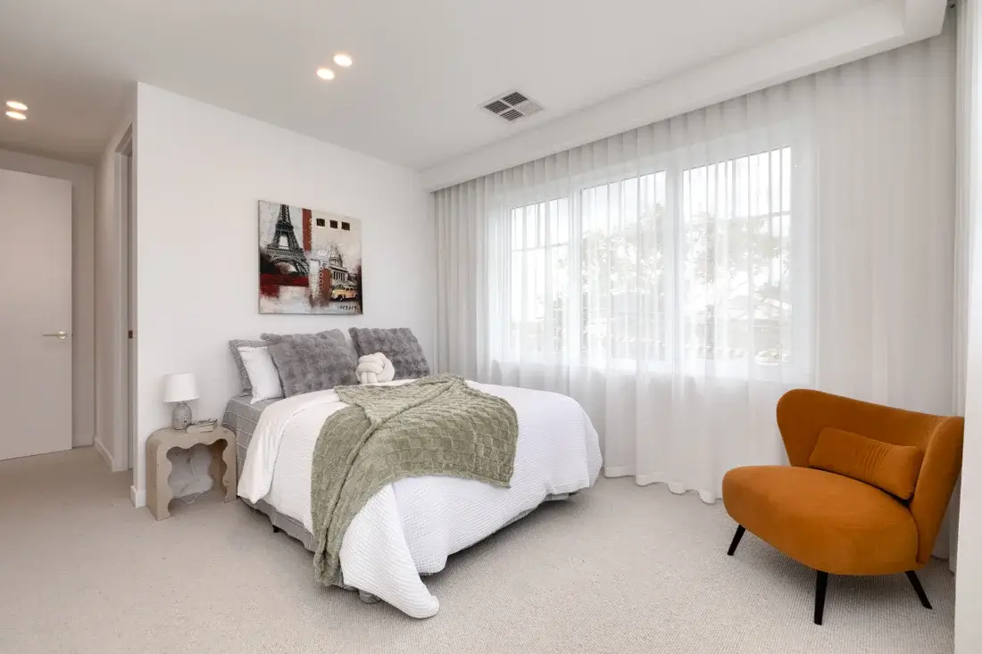 Shared Designer Bathroom with Skylight